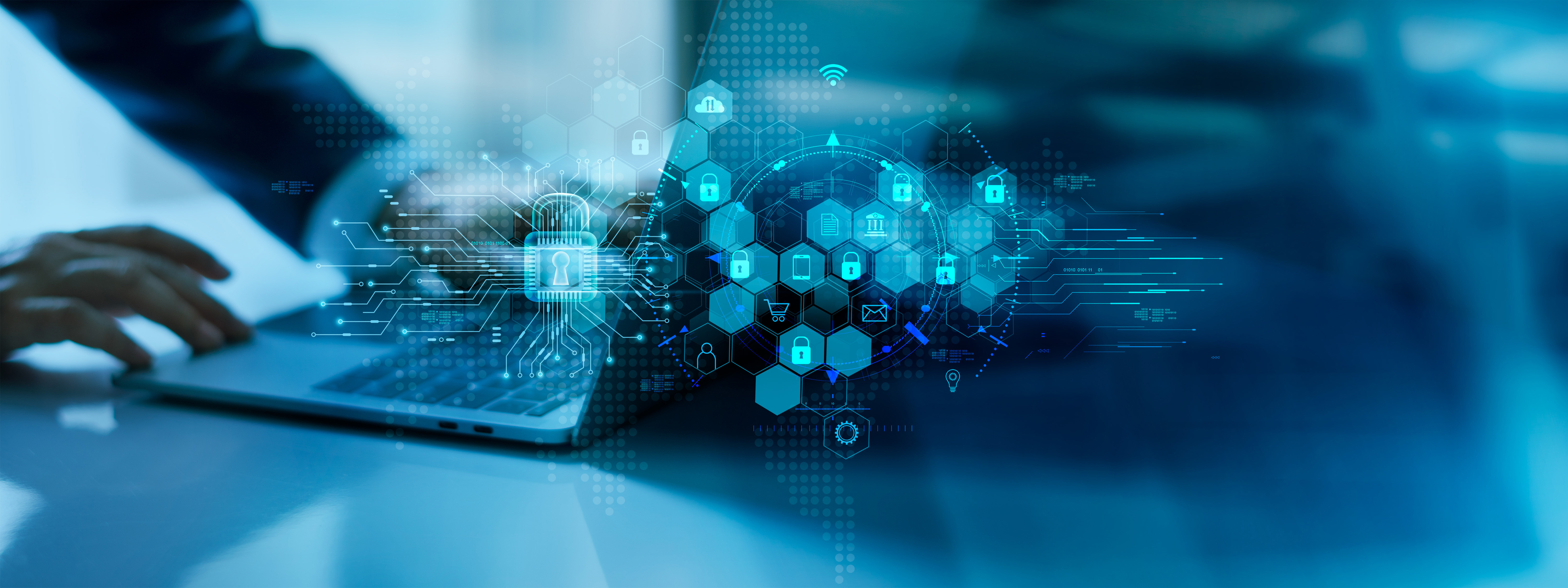 Hands typing with digital data overlay representing engineering and software development